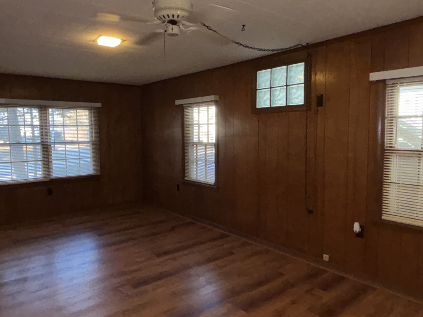 500 South Green Street Anna, IL 62906 - Photo 23 of 30 an empty room with wooden floor and windows
