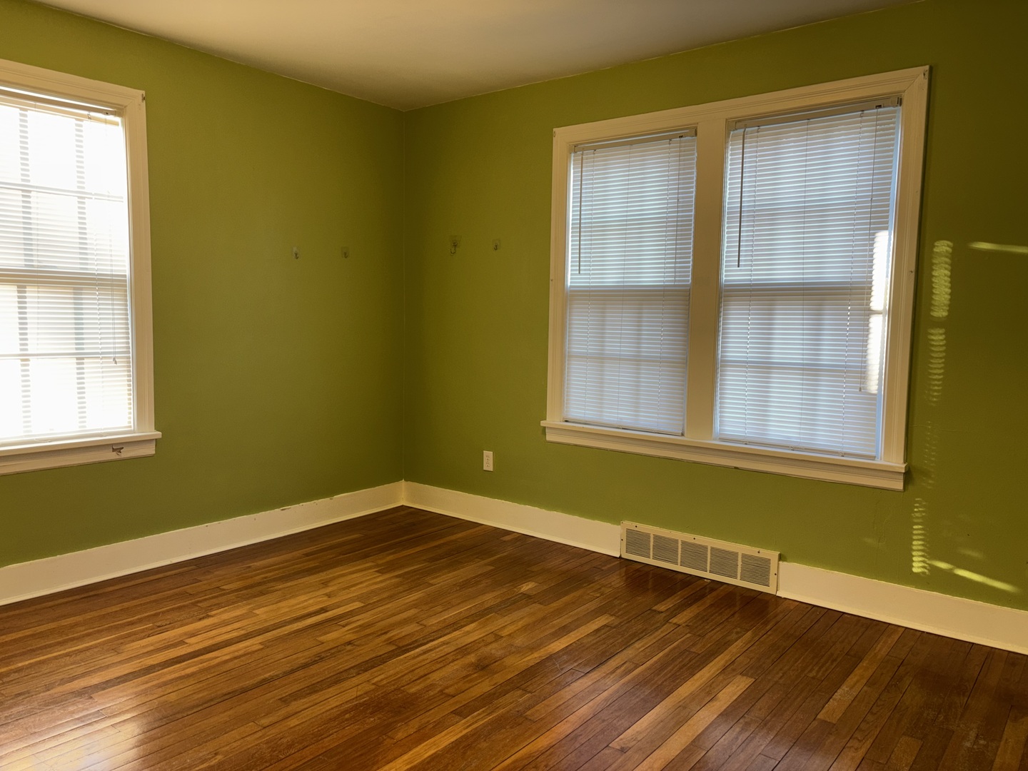 500 South Green Street Anna, IL 62906 - Photo 26 of 30 an empty room with wooden floor and windows
