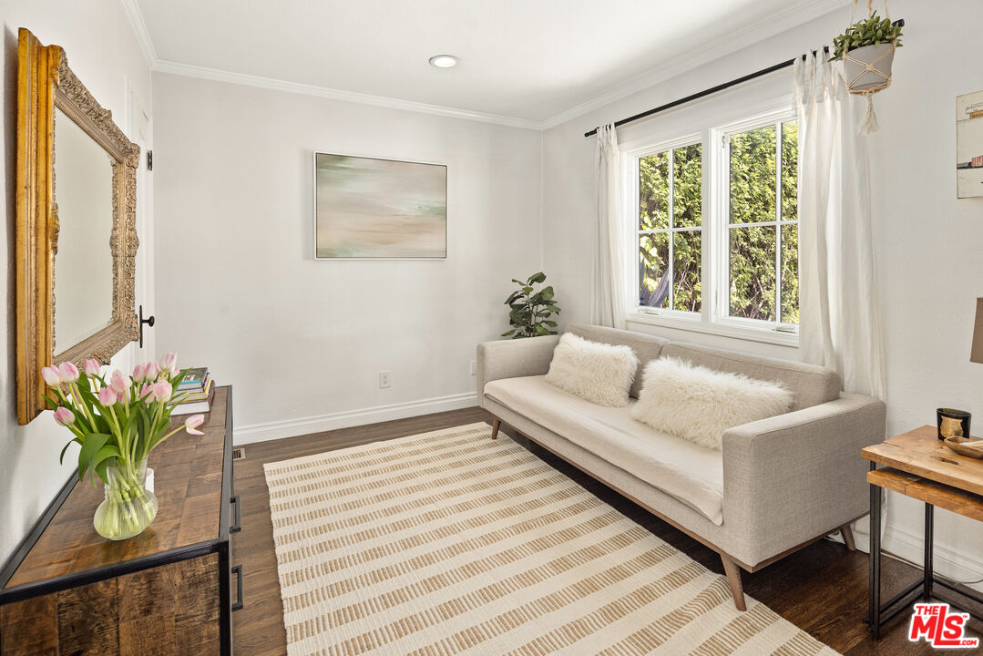 3320 Community Avenue Glendale, CA 91214 - Photo 18 of 32 a living room with furniture and a potted plant
