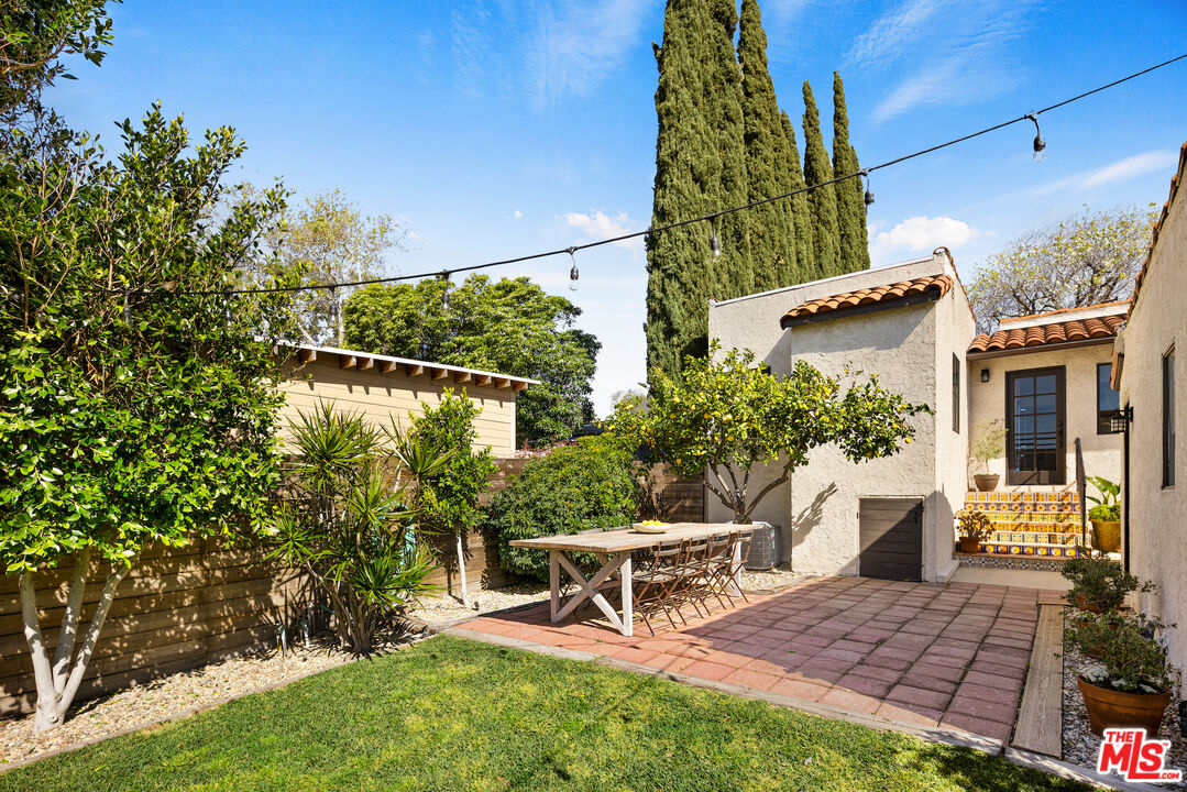 3320 Community Avenue Glendale, CA 91214 - Photo 22 of 32 a view of a chairs and table in backyard of the house
