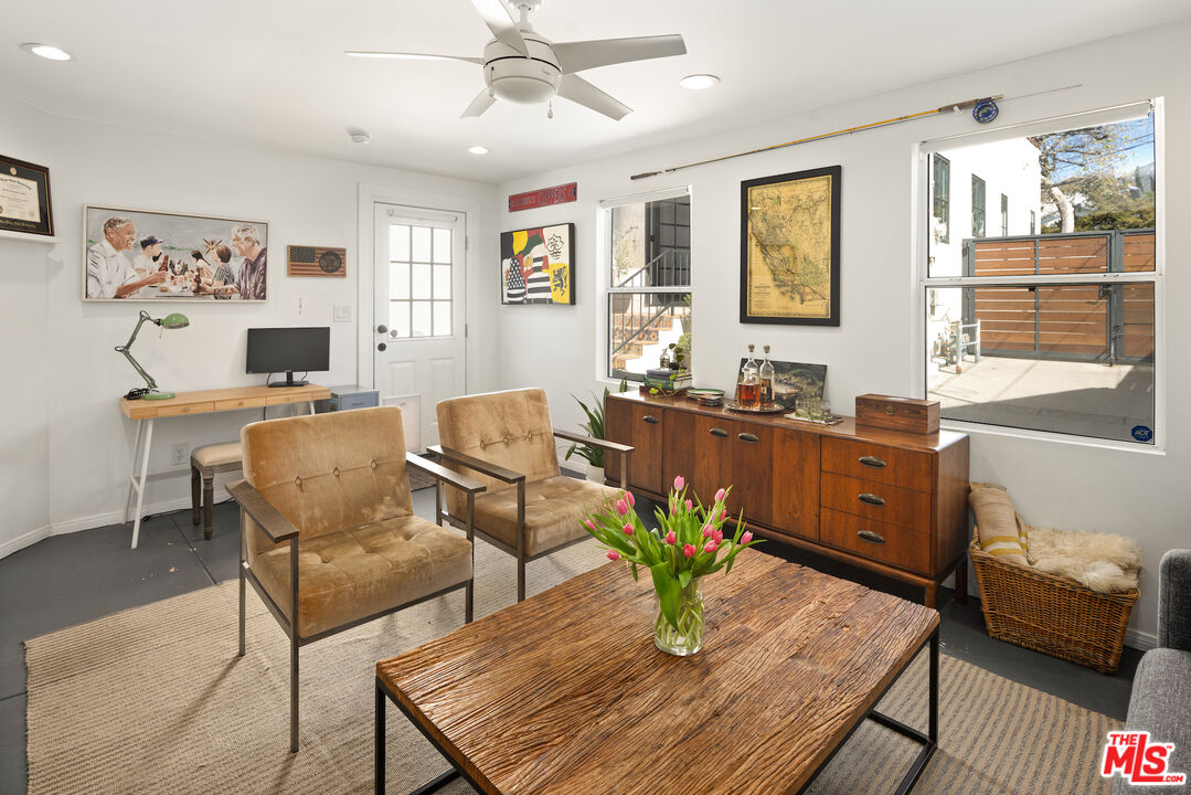 3320 Community Avenue Glendale, CA 91214 - Photo 27 of 32 a living room with furniture and a window