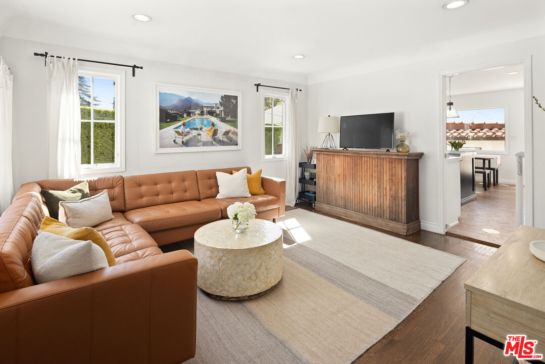 3320 Community Avenue Glendale, CA 91214 - Photo 6 of 32 a living room with furniture and a flat screen tv