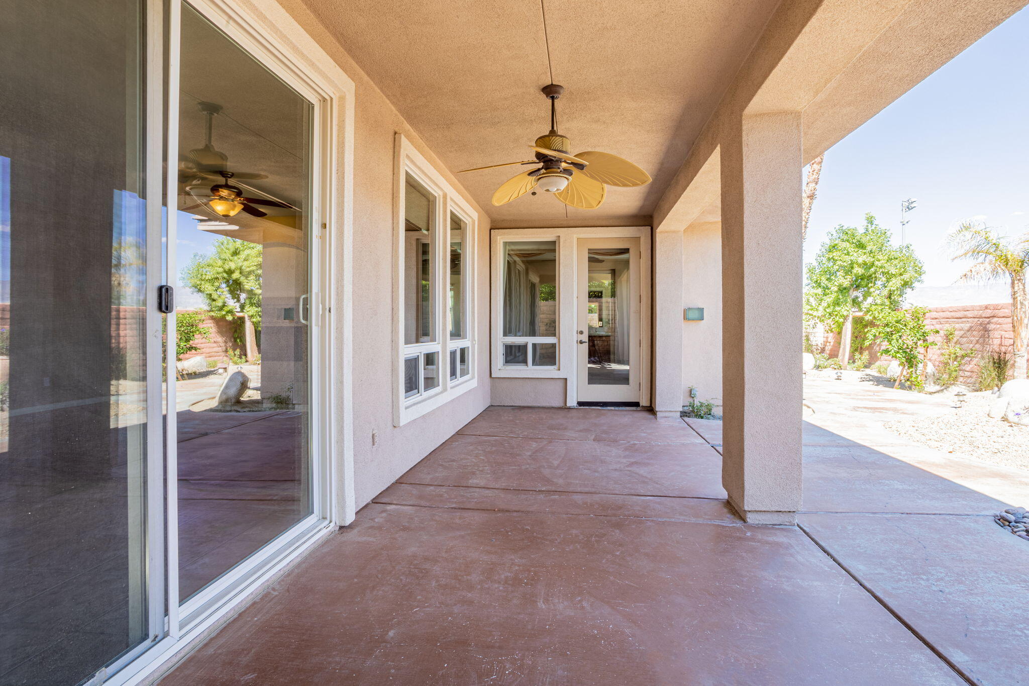 244 Via Padua Rancho Mirage, CA 92270 - Photo 21 of 30 a view of a hallway with wooden floor and windows