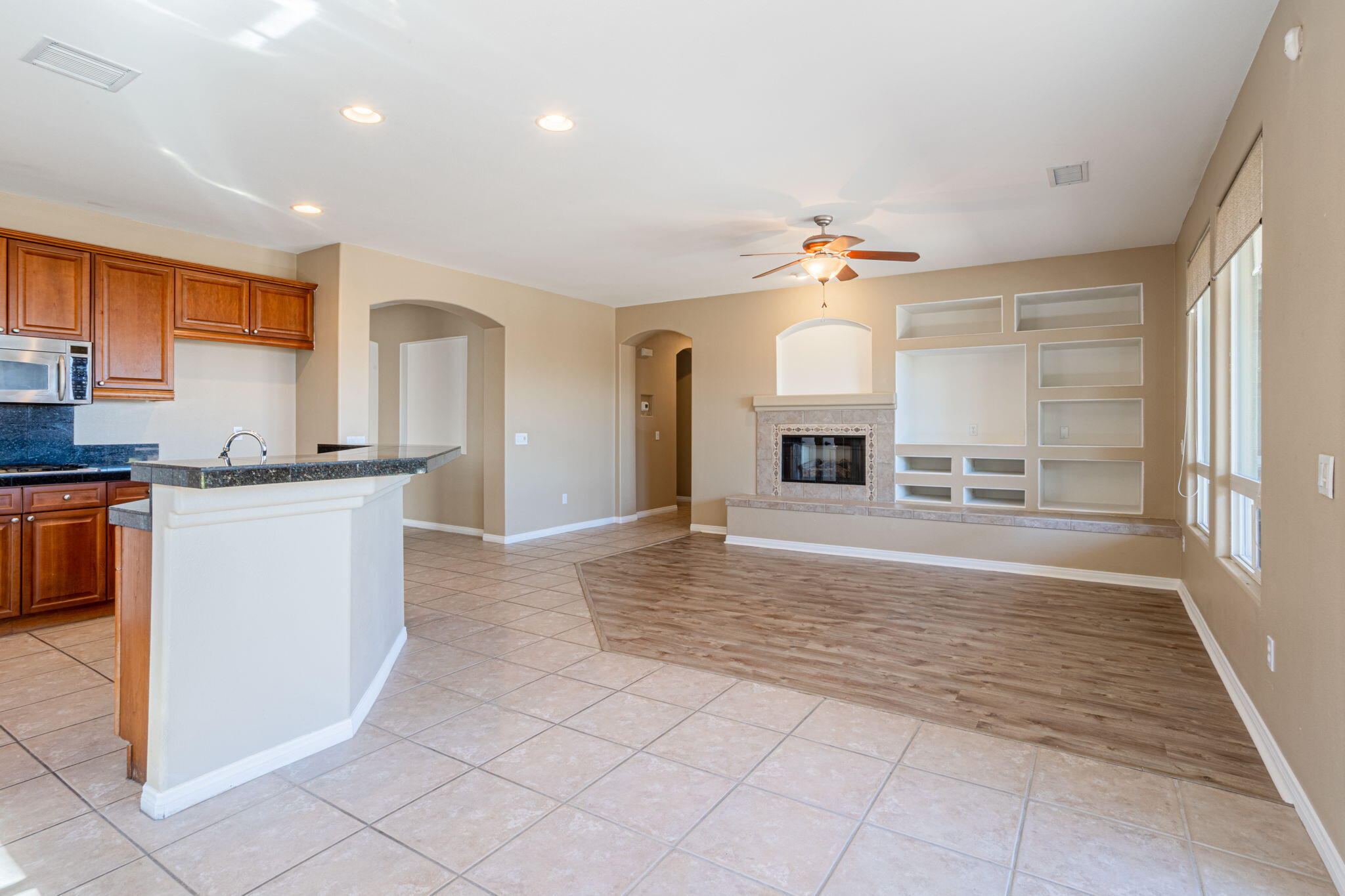 244 Via Padua Rancho Mirage, CA 92270 - Photo 8 of 30 a view of a kitchen with microwave and cabinets