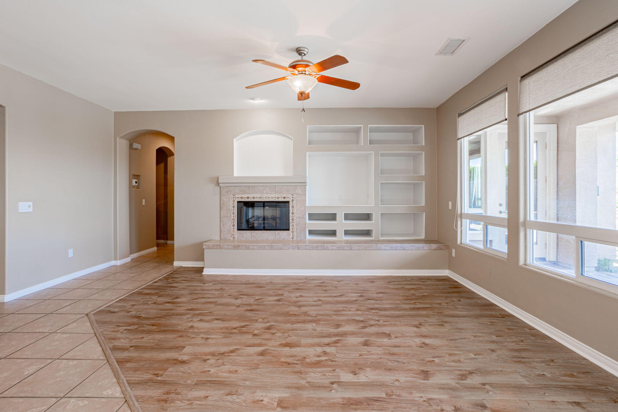 244 Via Padua Rancho Mirage, CA 92270 - Photo 9 of 30 a view of an empty room with a window and a fireplace