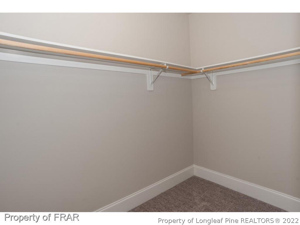 160 Winged Foot Road Pinehurst, NC 28374 - Photo 23 of 35 a view of an empty room