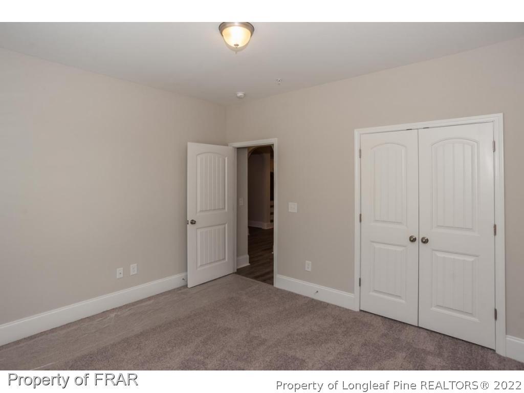 160 Winged Foot Road Pinehurst, NC 28374 - Photo 29 of 35 a view of an empty room