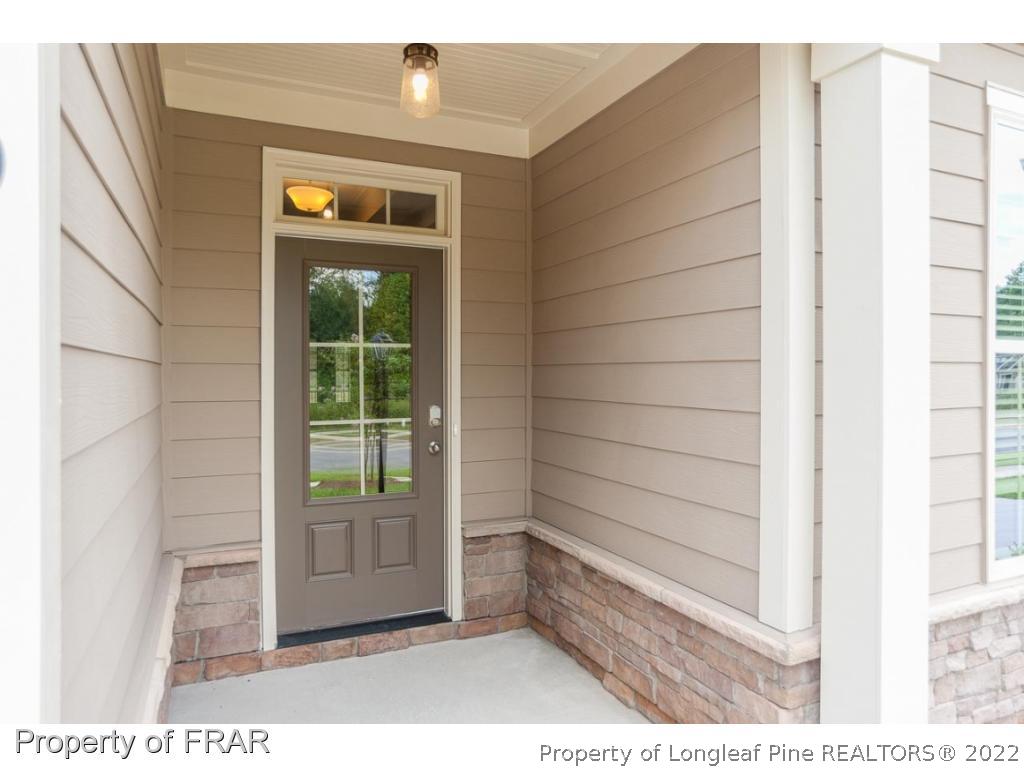 160 Winged Foot Road Pinehurst, NC 28374 - Photo 4 of 35 a view of a porch
