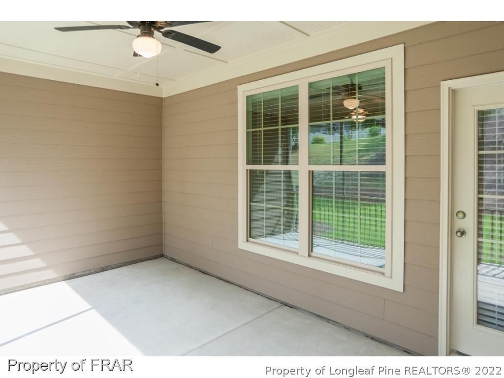 160 Winged Foot Road Pinehurst, NC 28374 - Photo 5 of 35 a view of an empty room with a window