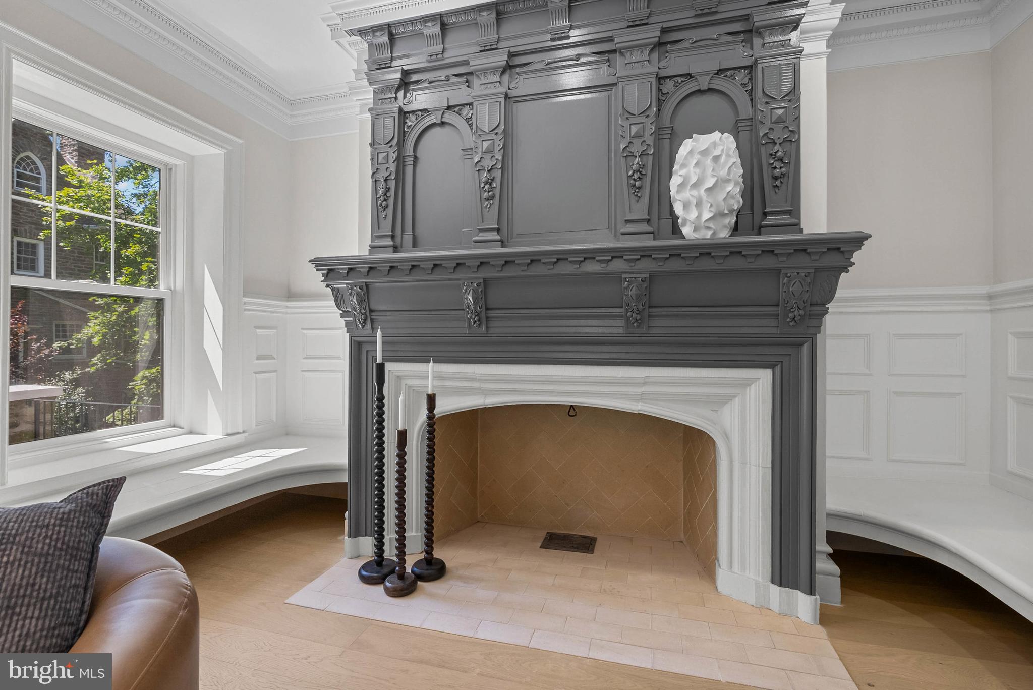 319 Pelham Road Philadelphia, PA 19119 - Photo 12 of 40 a living room with furniture and a fireplace