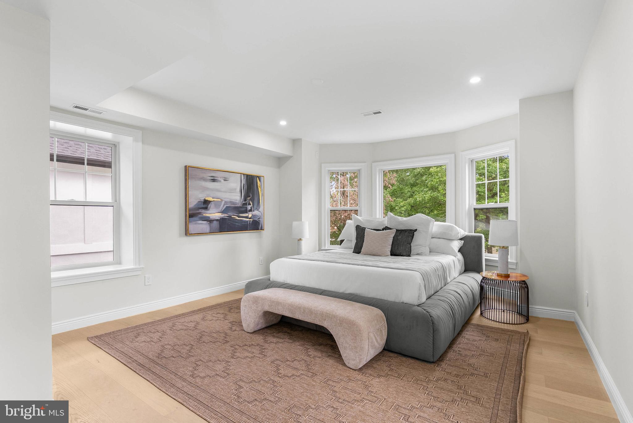319 Pelham Road Philadelphia, PA 19119 - Photo 16 of 40 a spacious bedroom with a bed and glass window