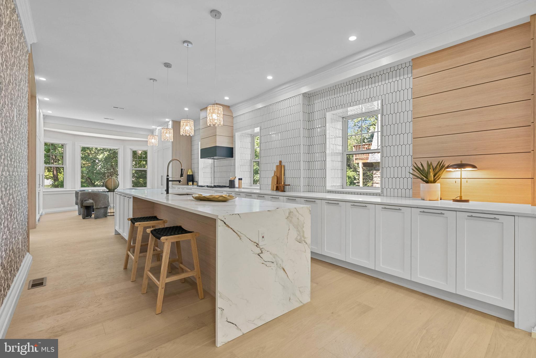 319 Pelham Road Philadelphia, PA 19119 - Photo 2 of 40 a kitchen with white cabinets and sink