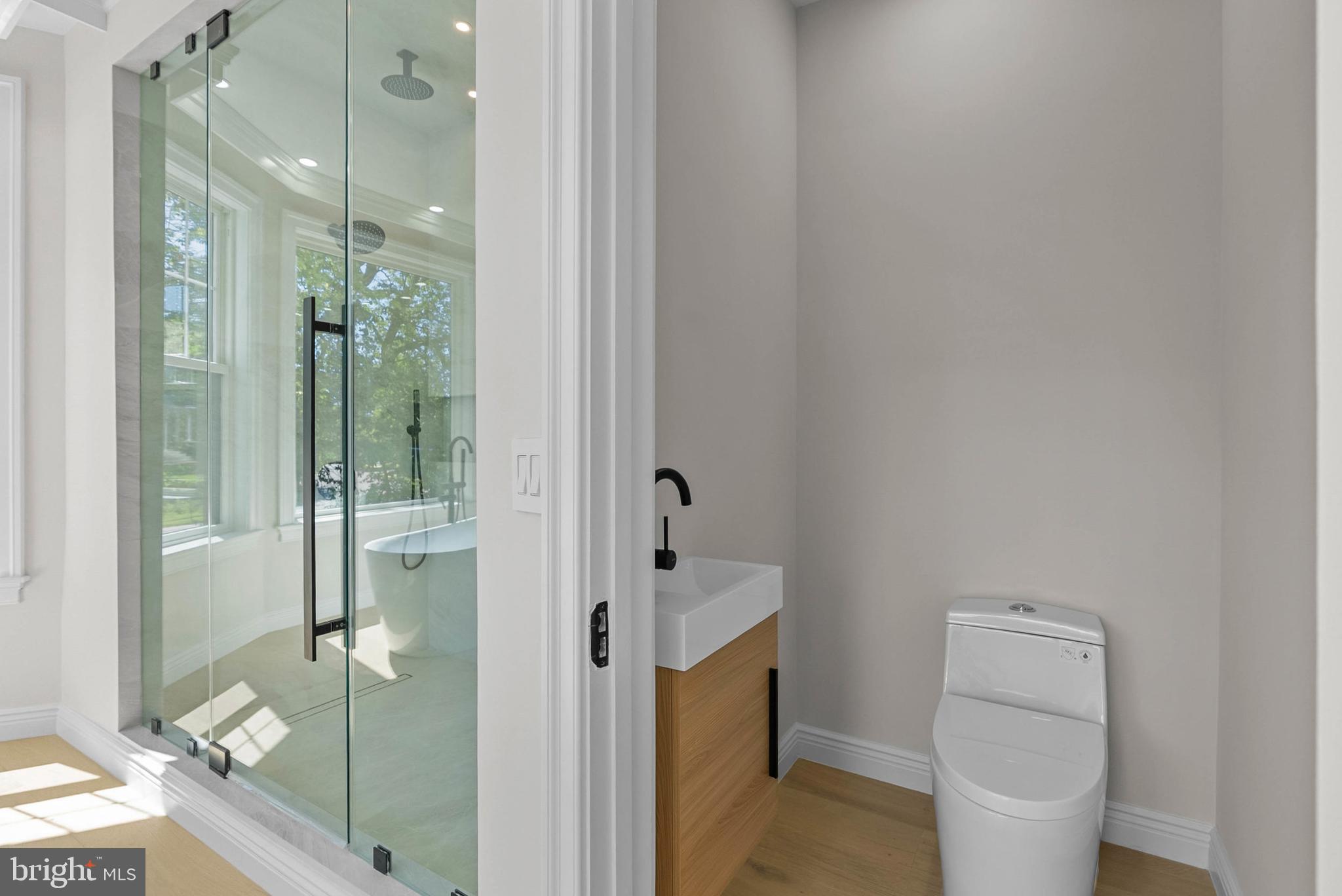 319 Pelham Road Philadelphia, PA 19119 - Photo 23 of 40 a bathroom with a toilet and a shower