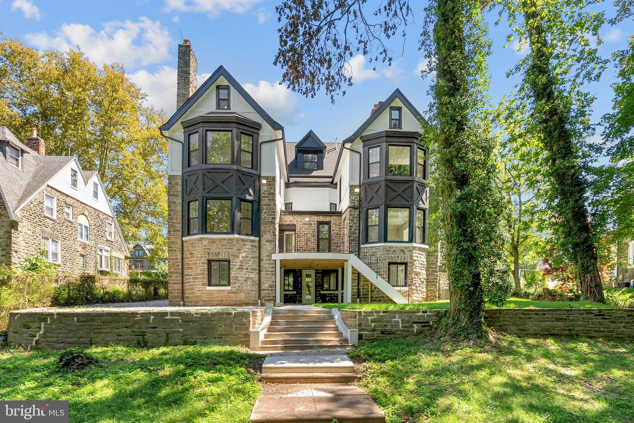 319 Pelham Road Philadelphia, PA 19119 - Photo 40 of 40 a front view of a house with a yard