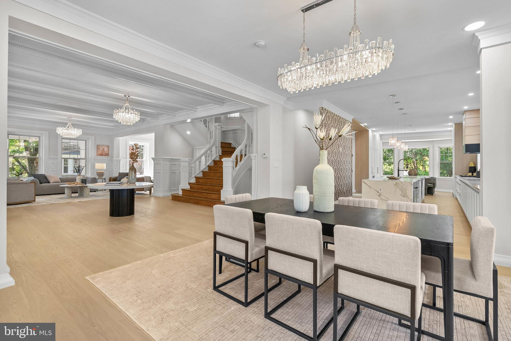 319 Pelham Road Philadelphia, PA 19119 - Photo 6 of 40 a living room with fireplace furniture and a chandelier
