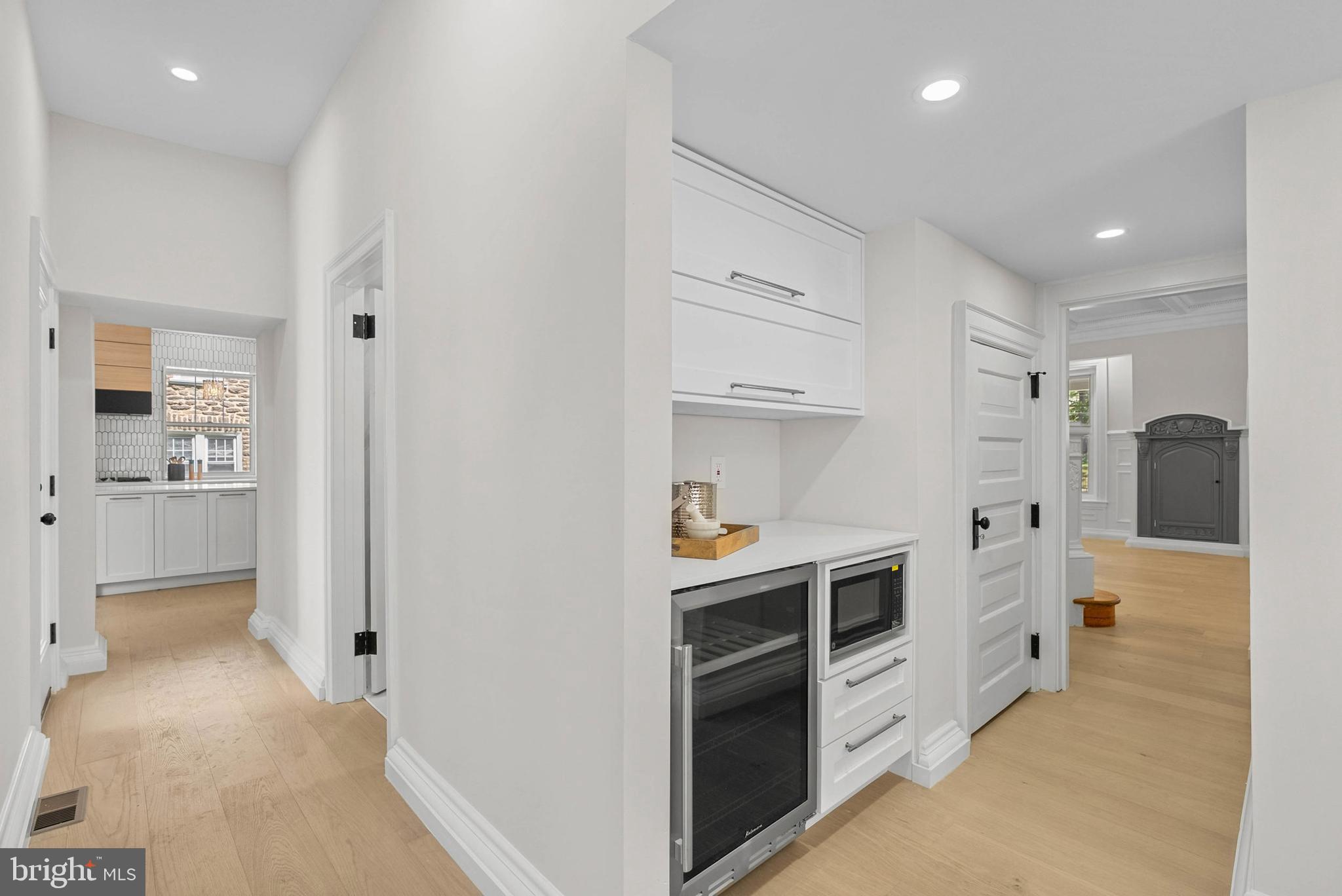 319 Pelham Road Philadelphia, PA 19119 - Photo 8 of 40 a view of a kitchen with white cabinets