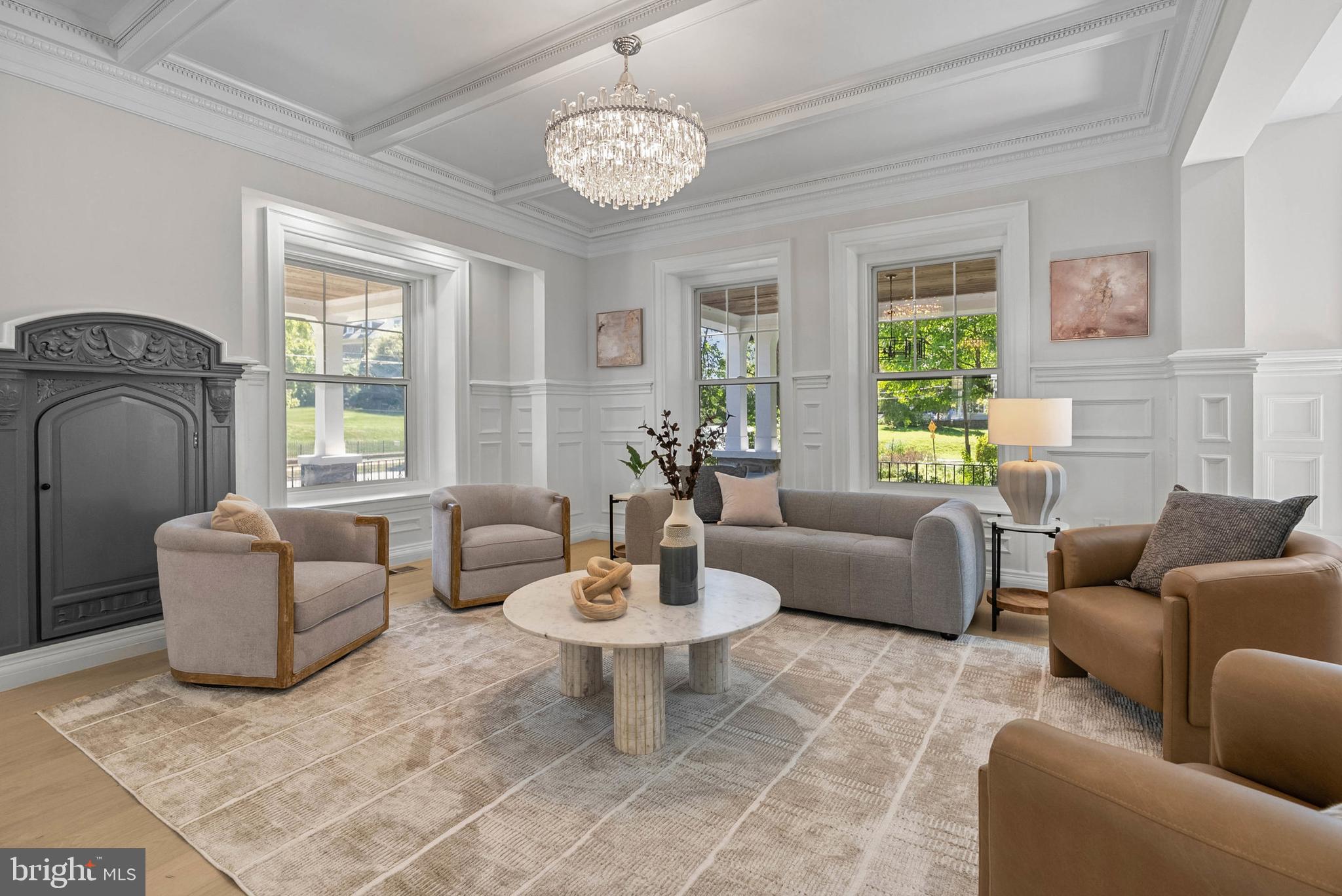 319 Pelham Road Philadelphia, PA 19119 - Photo 10 of 40 a living room with fireplace furniture and a large window