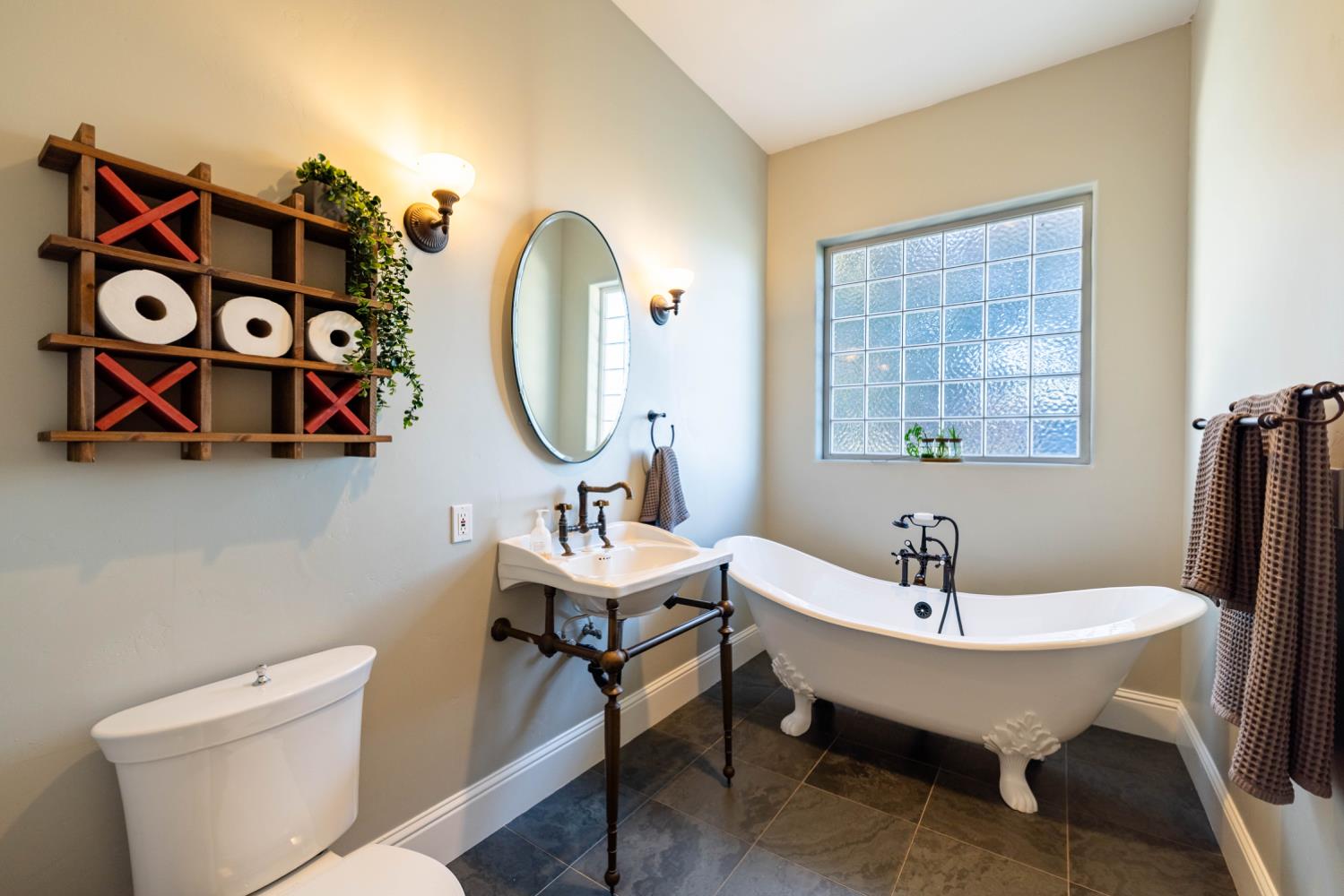 5840 China Hill Road El Dorado, CA 95623 - Photo 24 of 84 a bathroom with a toilet sink and mirror