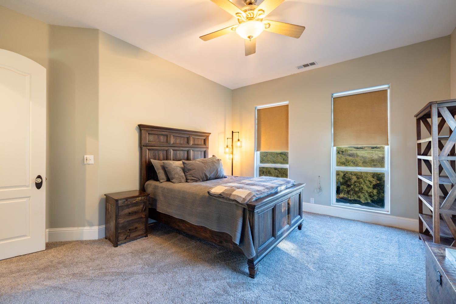 5840 China Hill Road El Dorado, CA 95623 - Photo 28 of 84 a bedroom with a bed and a chandelier