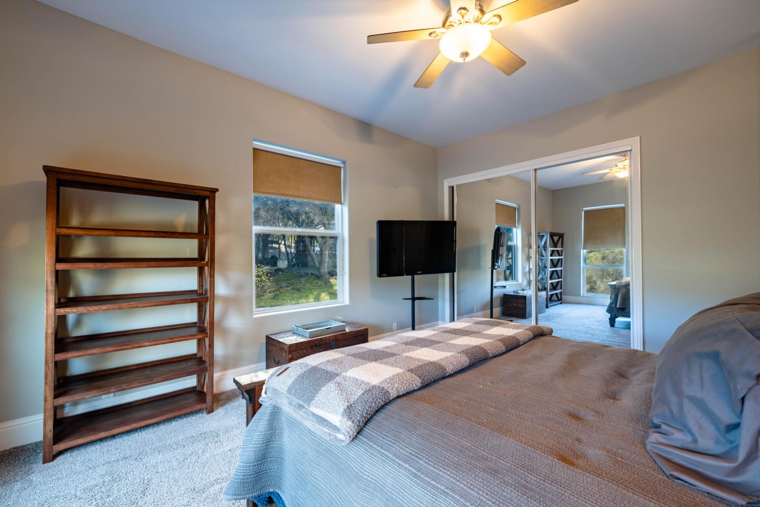 5840 China Hill Road El Dorado, CA 95623 - Photo 29 of 84 a bedroom with a bed and a flat screen tv