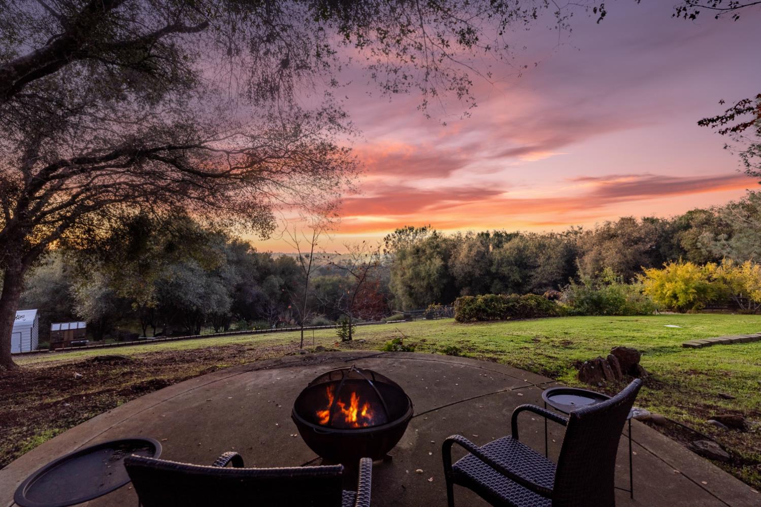 5840 China Hill Road El Dorado, CA 95623 - Photo 74 of 84 a view of a backyard with table and chairs and a yard