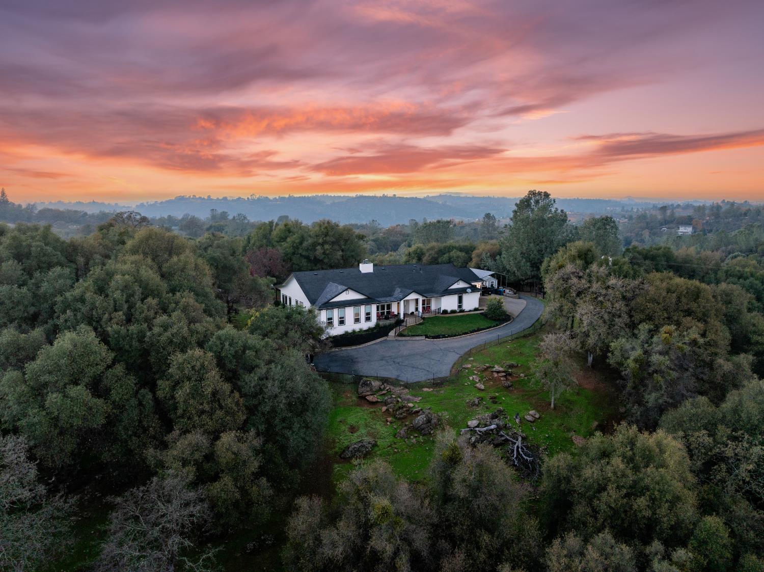 5840 China Hill Road El Dorado, CA 95623 - Photo 77 of 84 a view of a city with lush green forest