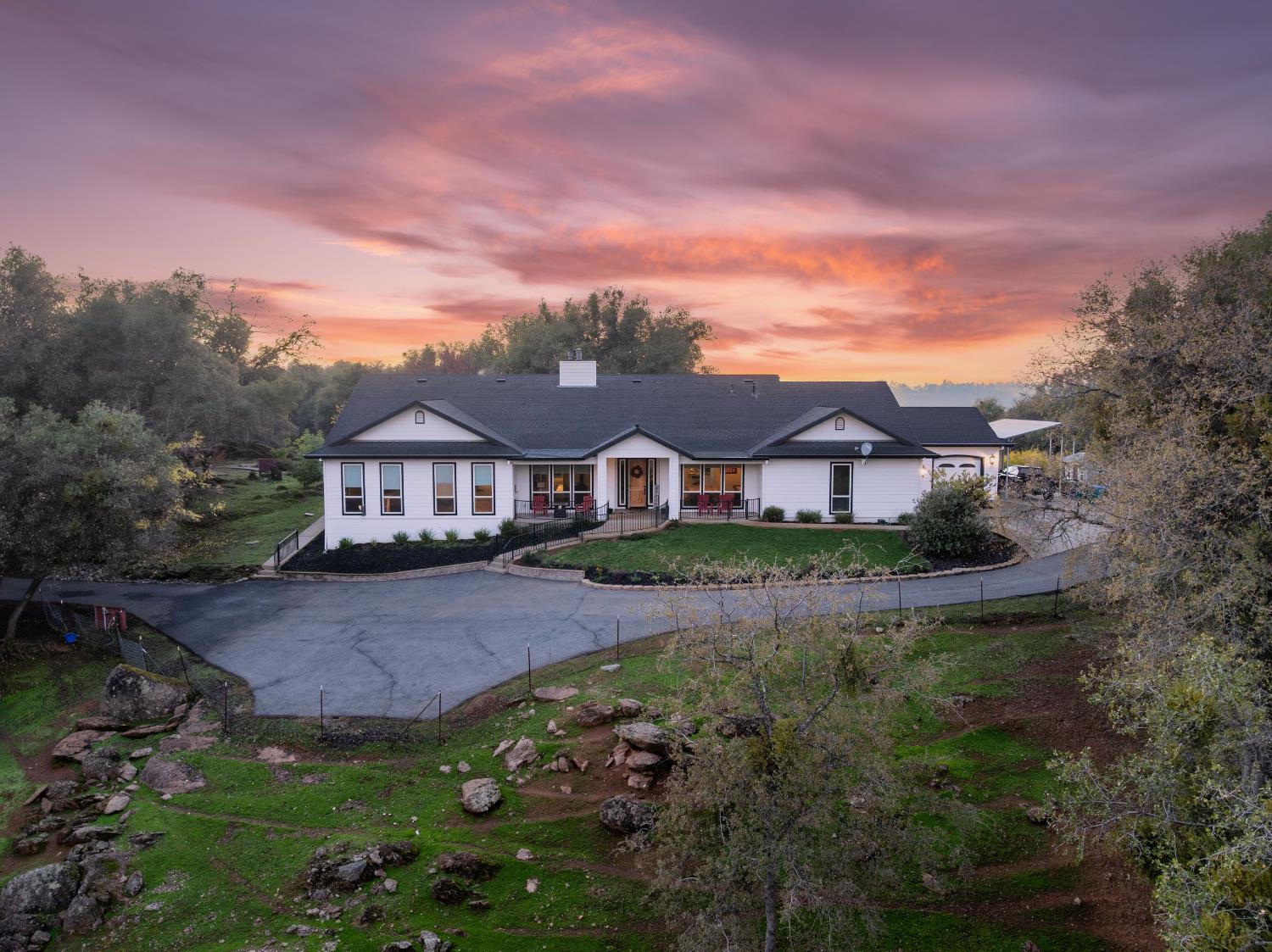 5840 China Hill Road El Dorado, CA 95623 - Photo 79 of 84 a front view of a house with yard and green space