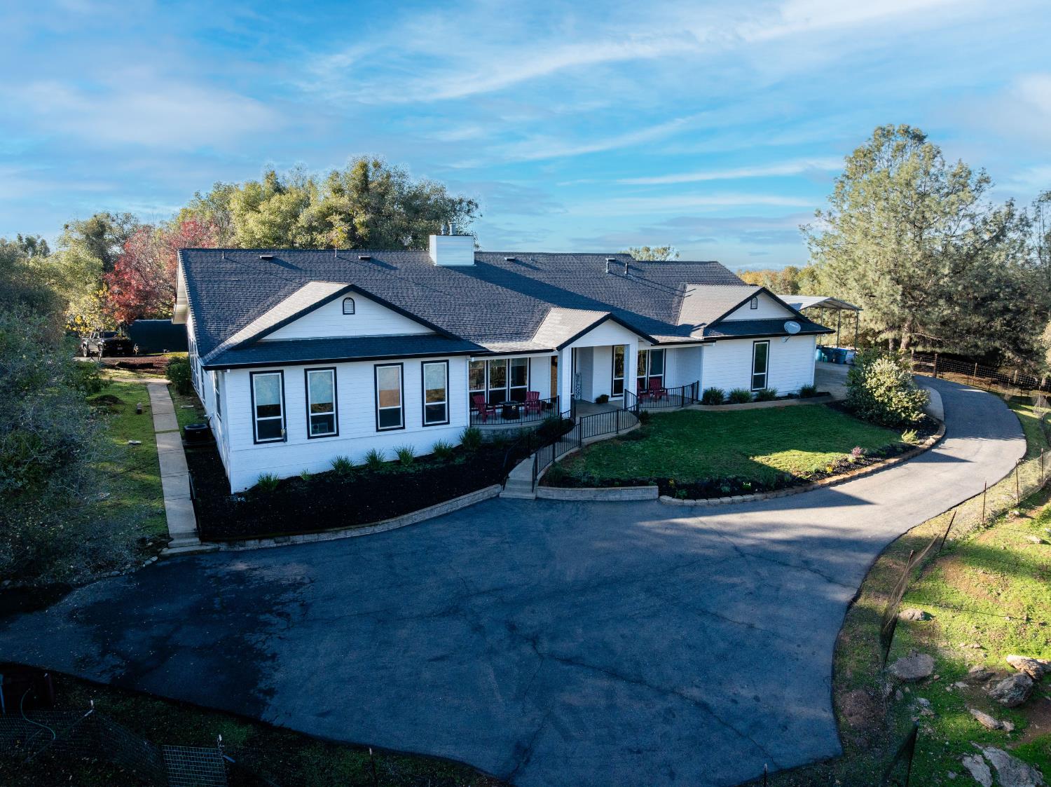 5840 China Hill Road El Dorado, CA 95623 - Photo 81 of 84 a front view of a house with a garden