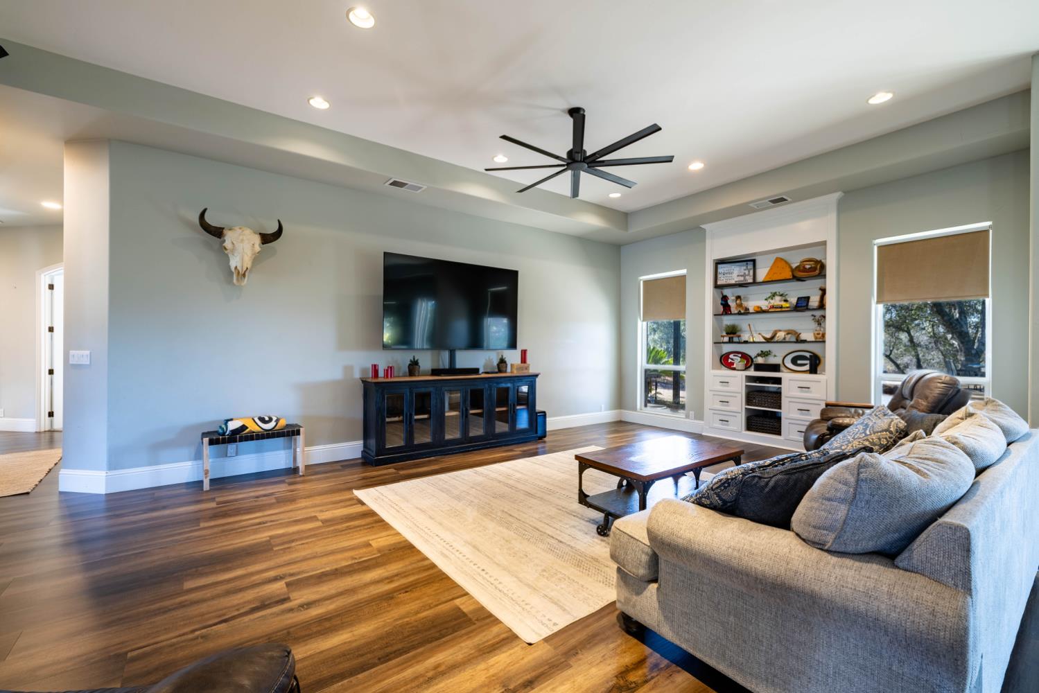 5840 China Hill Road El Dorado, CA 95623 - Photo 10 of 84 a living room with furniture and a flat screen tv