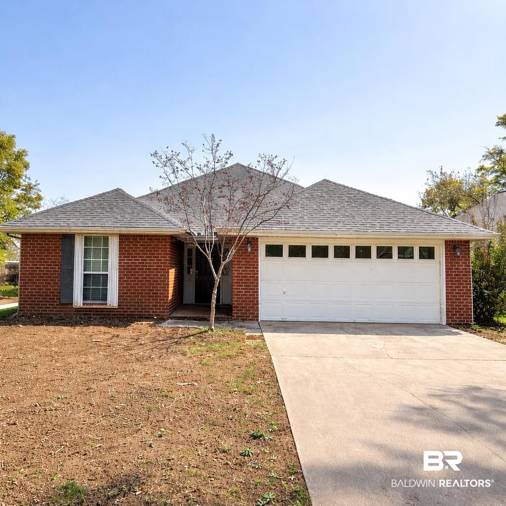 108 Davison Loop Fairhope, AL 36532 - Photo 1 of 17 Ranch-style house featuring brick siding, driveway, roof with shingles, and an attached garage
