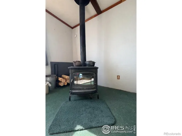 a living room with furniture and a gate