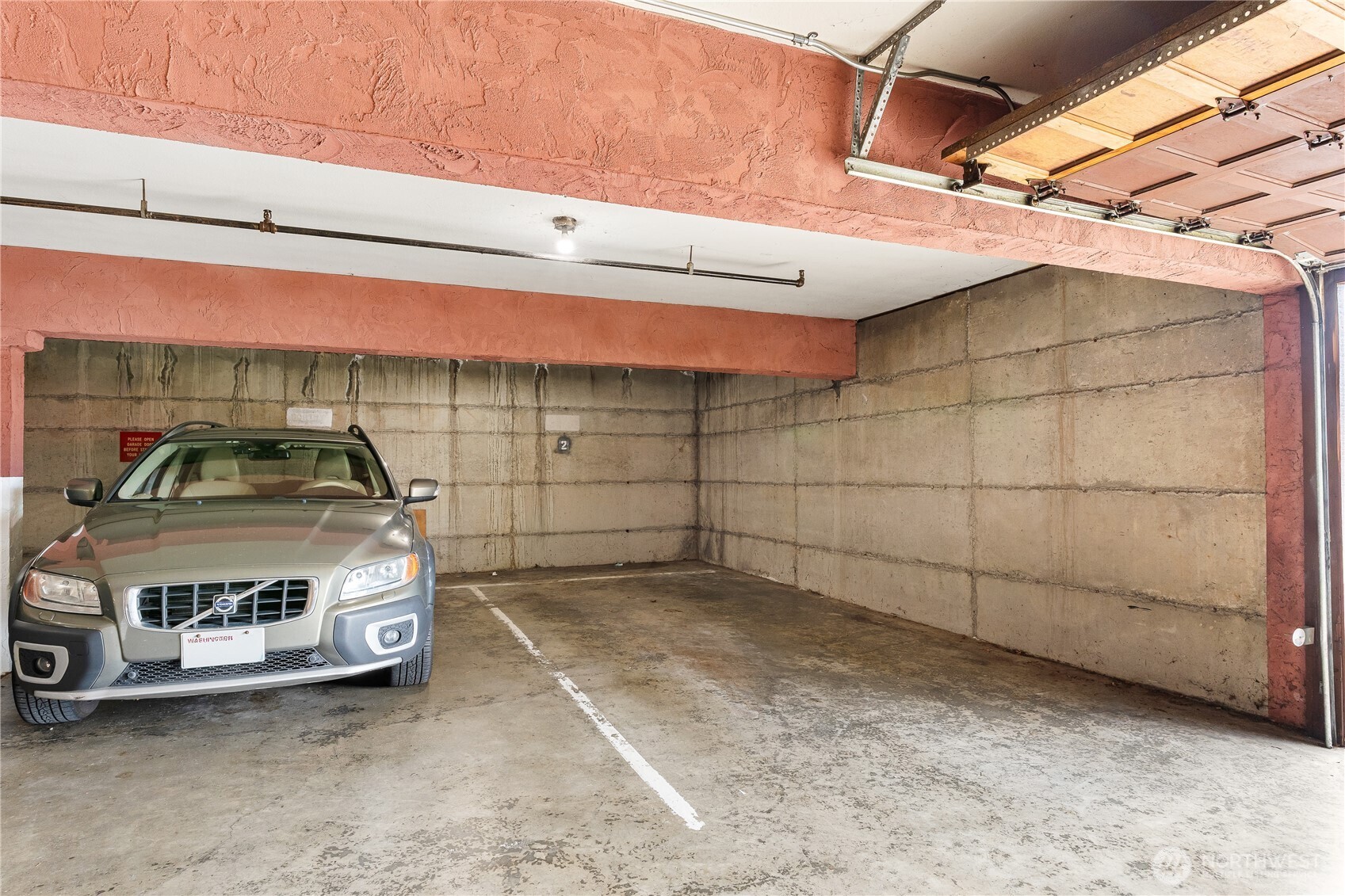2619 Rucker Avenue, Unit 2 Everett, WA 98201 - Photo 26 of 33 a car parked in garage