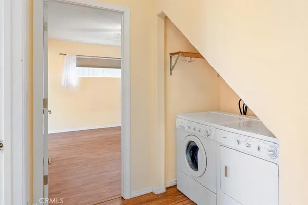 a view of livingroom with washer and dryer