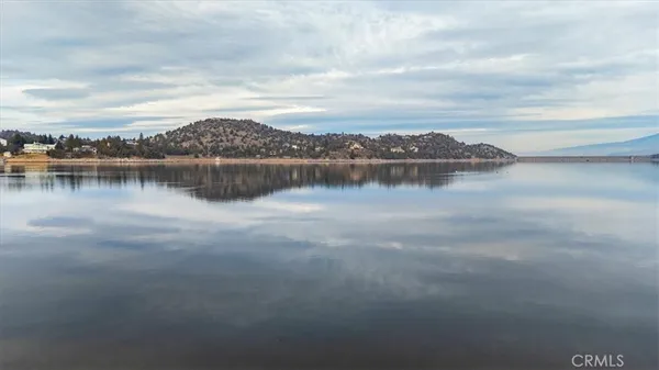 a view of a lake with a city