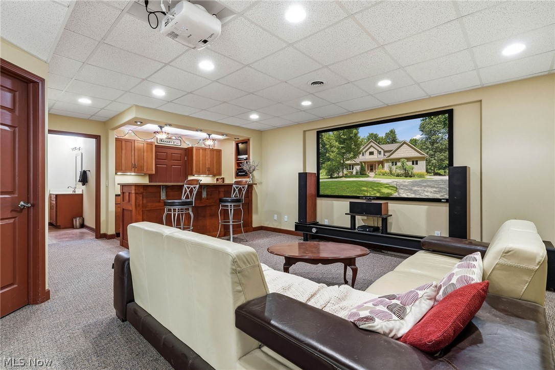 3199 Blake Road Wadsworth, OH 44281 - Photo 26 of 39 Home theater, built-in wet bar with wood cabinetry, recessed lighting. Theater equipment to remain