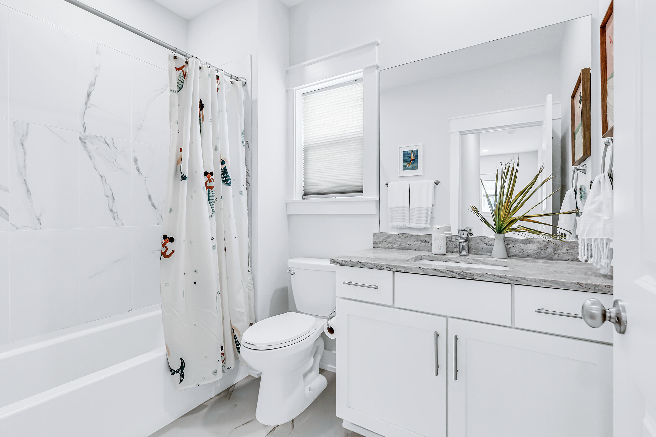 45 Valdare Ln Inlet Beach Inlet Beach, FL 32461 - Photo 25 of 37 a bathroom with a granite countertop sink a toilet and a bathtub