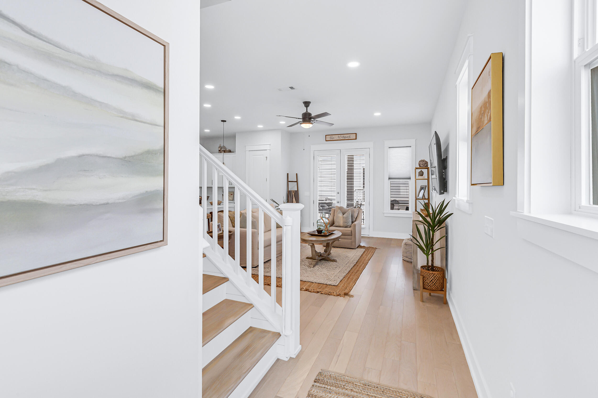 45 Valdare Ln Inlet Beach Inlet Beach, FL 32461 - Photo 6 of 37 a view of a hallway with wooden floor and staircase
