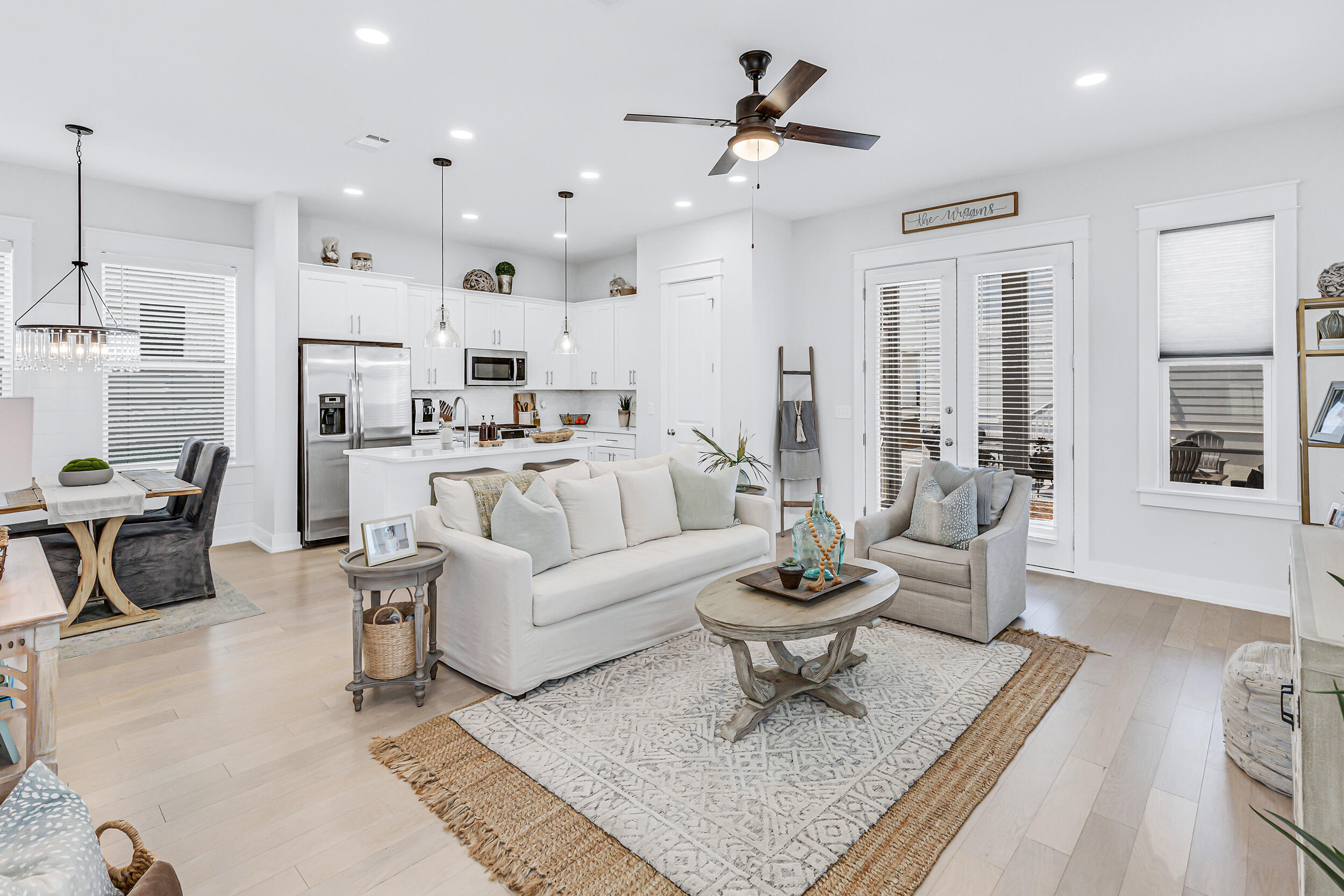 45 Valdare Ln Inlet Beach Inlet Beach, FL 32461 - Photo 7 of 37 a living room with furniture a rug and a chandelier