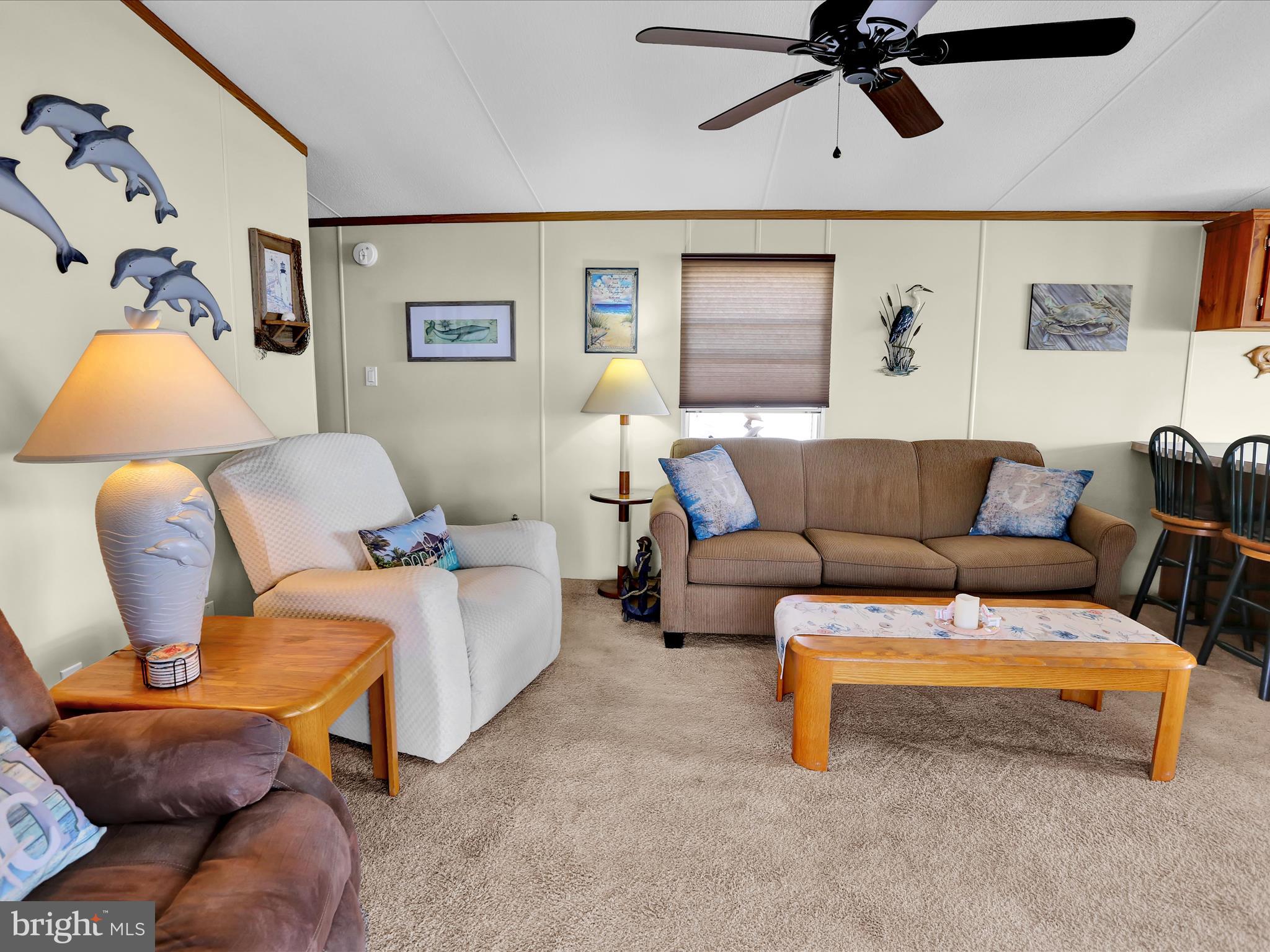 27412 Grove Circle Road Millsboro, DE 19966 - Photo 14 of 43 a living room with furniture and a couch