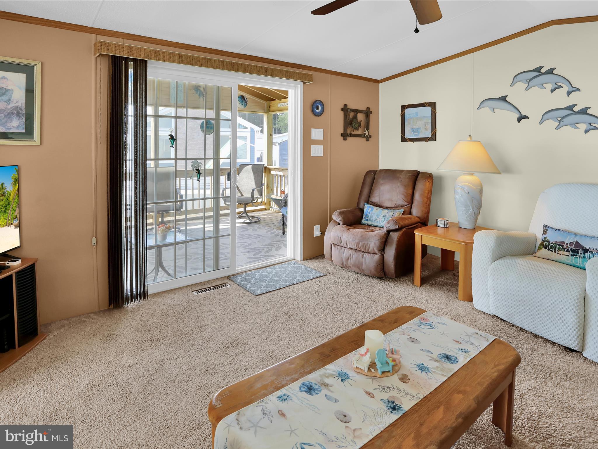 27412 Grove Circle Road Millsboro, DE 19966 - Photo 16 of 43 a bed room with a bed and a chair