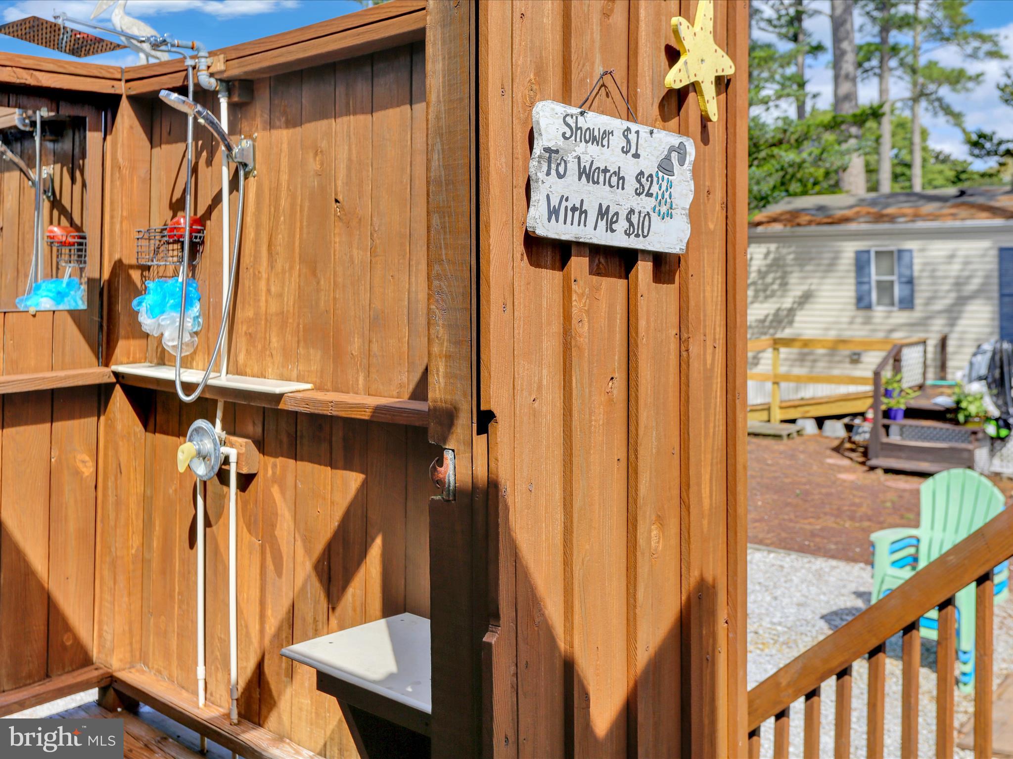27412 Grove Circle Road Millsboro, DE 19966 - Photo 31 of 43 a view of a walk in closet