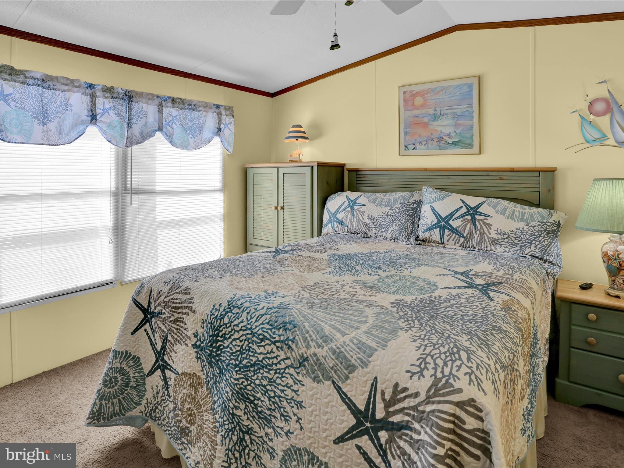 27412 Grove Circle Road Millsboro, DE 19966 - Photo 40 of 43 a bedroom with a bed and a window