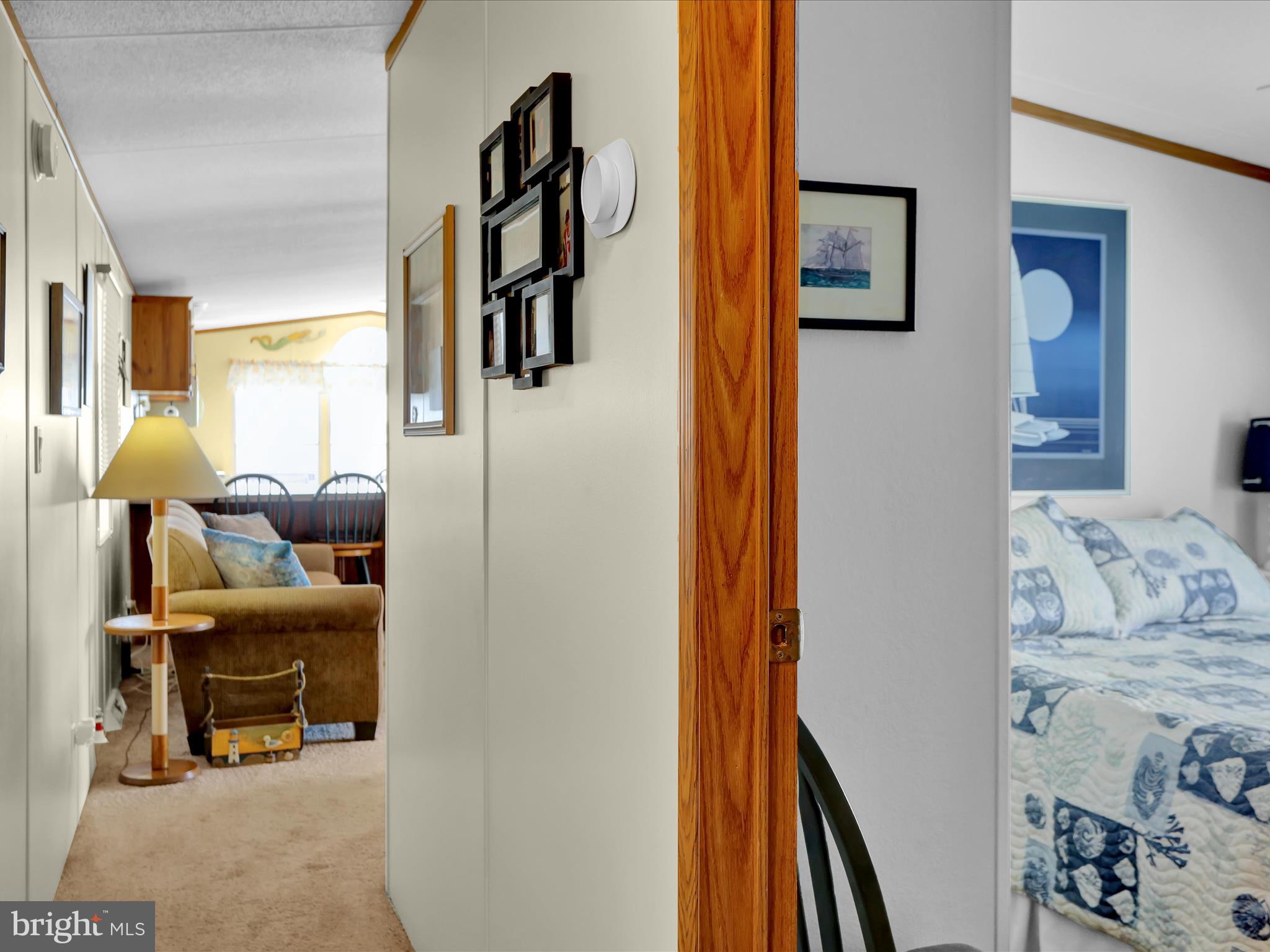 27412 Grove Circle Road Millsboro, DE 19966 - Photo 42 of 43 a bedroom with furniture and a window