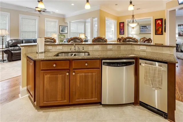 a bedroom with a bed and a lamp on table