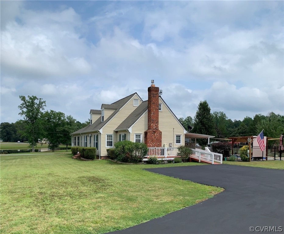 17456 Doggetts Fork Road Ruther Glen, VA 22546 - Photo 36 of 41 Parklike setting with a pond view.