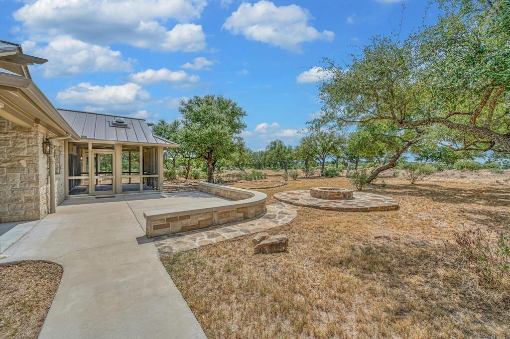 3989 Sunset Cliff Road Burnet, TX 78611 - Photo 37 of 40 Patio, Fire Pit, Screened Porch