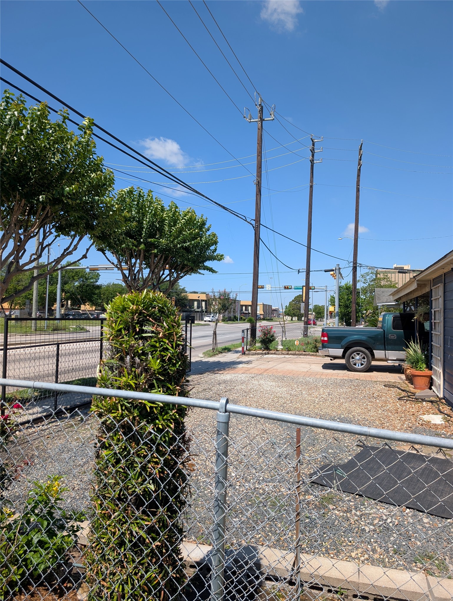 109 East Parker Road Houston, TX 77076 - Photo 8 of 11 a view of a street with large trees