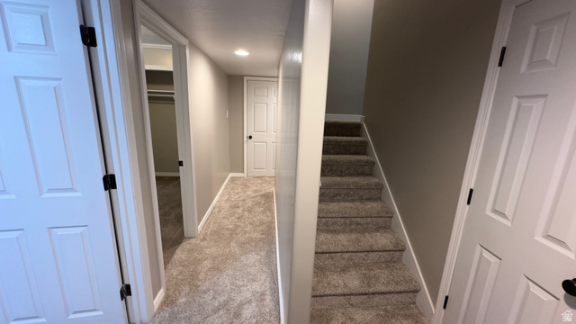 3547 East Golden Eagle Road Eagle Mountain, UT 84005 - Photo 27 of 47 Staircase featuring carpet and recessed lighting