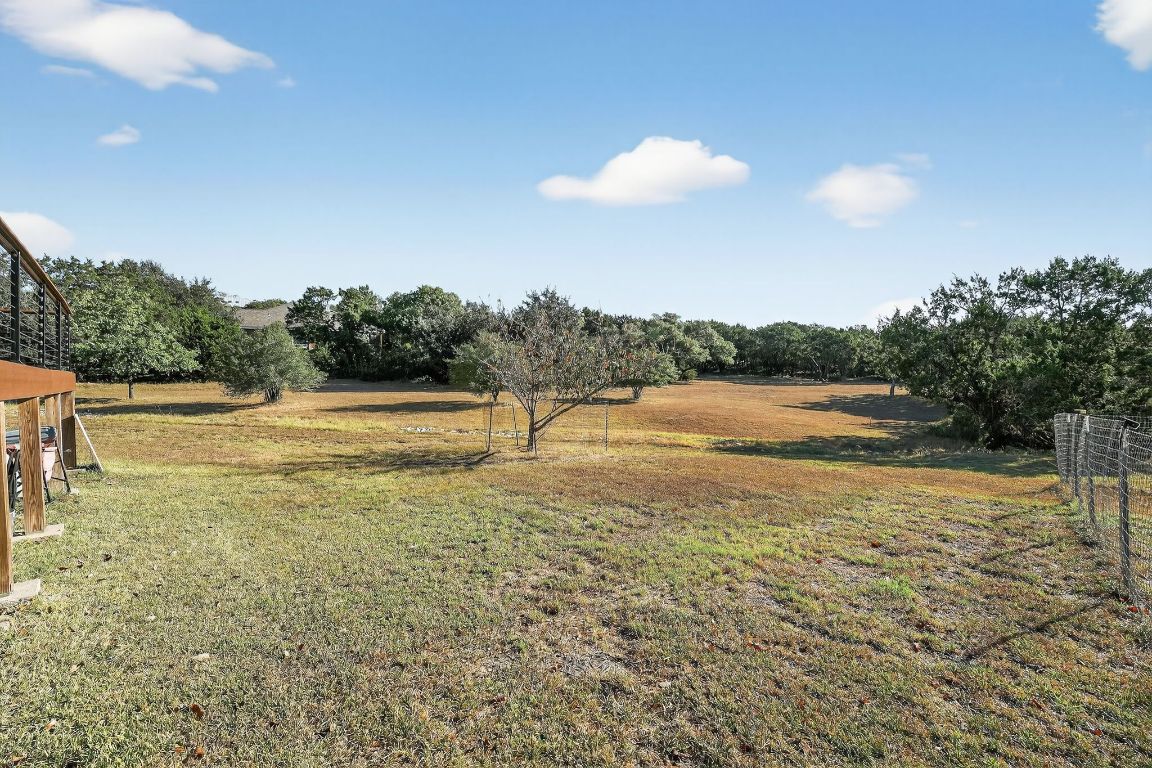 1021 Westland Ridge Road Dripping Springs, TX 78620 - Photo 18 of 31 a view of an ocean and a mountain