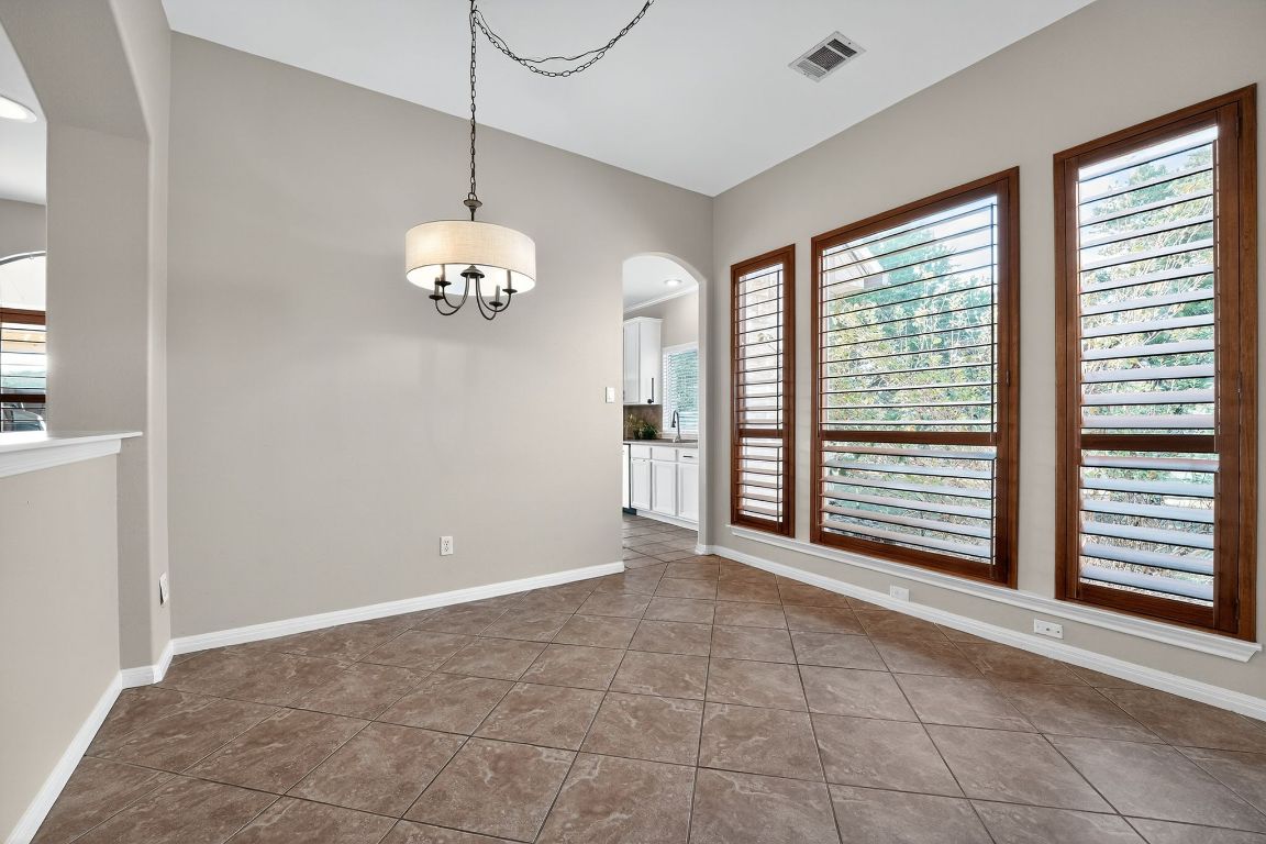 1021 Westland Ridge Road Dripping Springs, TX 78620 - Photo 21 of 31 a view of an empty room with a window